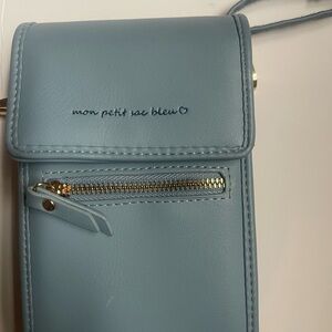 Powder Blue Leather Crossbody Bag with Flap Closure